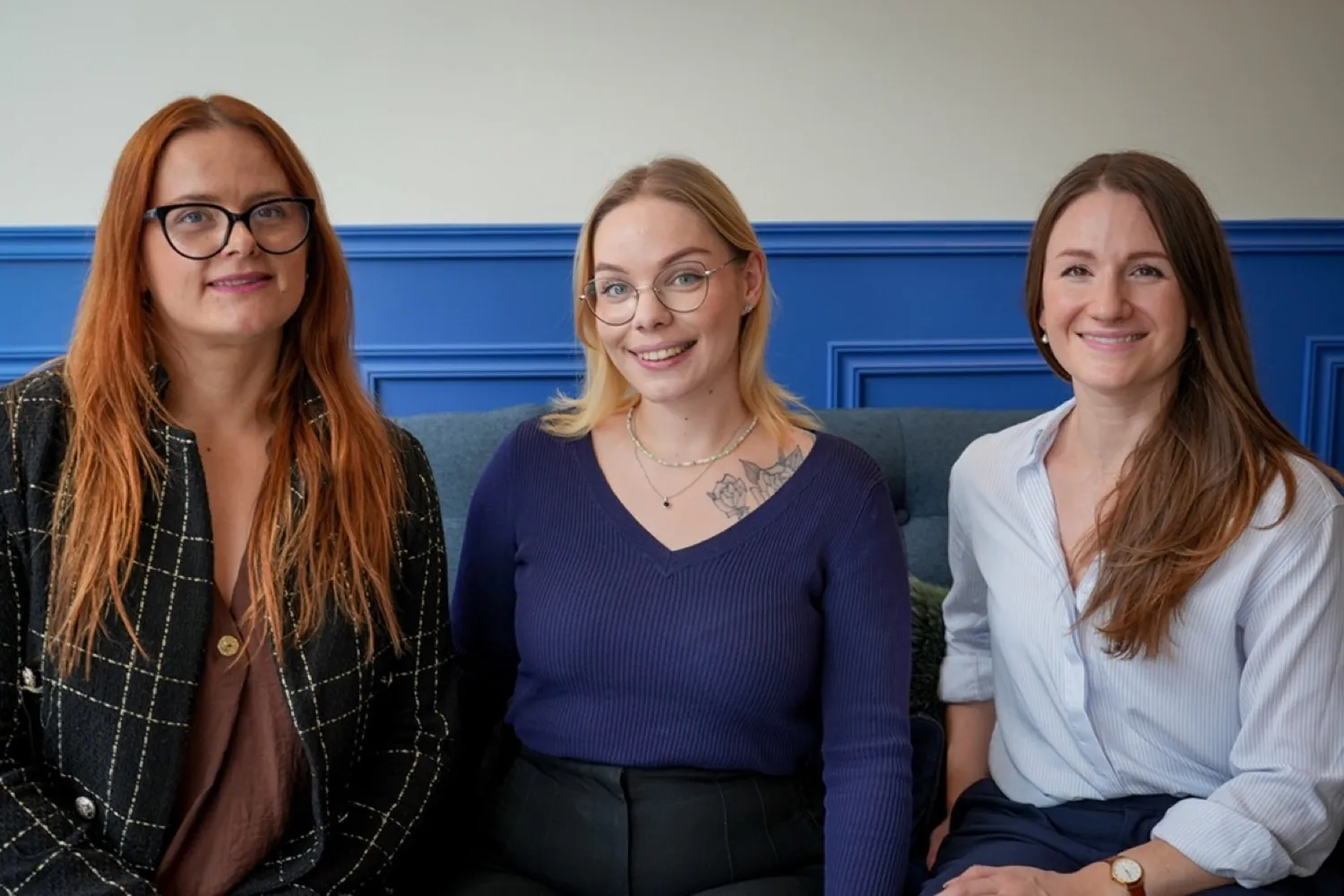 Three Paramount Properties specialists sitting together