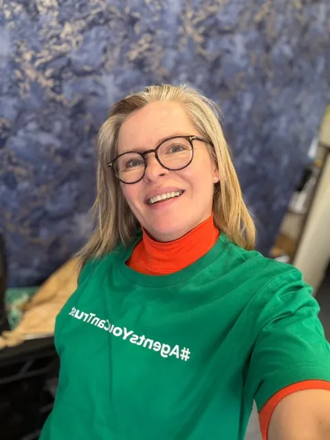 A member of JDG Estate Agents wearing the network's Agents You Can Trust shirt