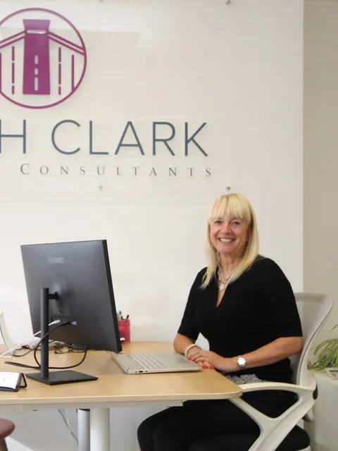 A member of Sarah Clark Properties wearing the network's Agents You Can Trust shirt